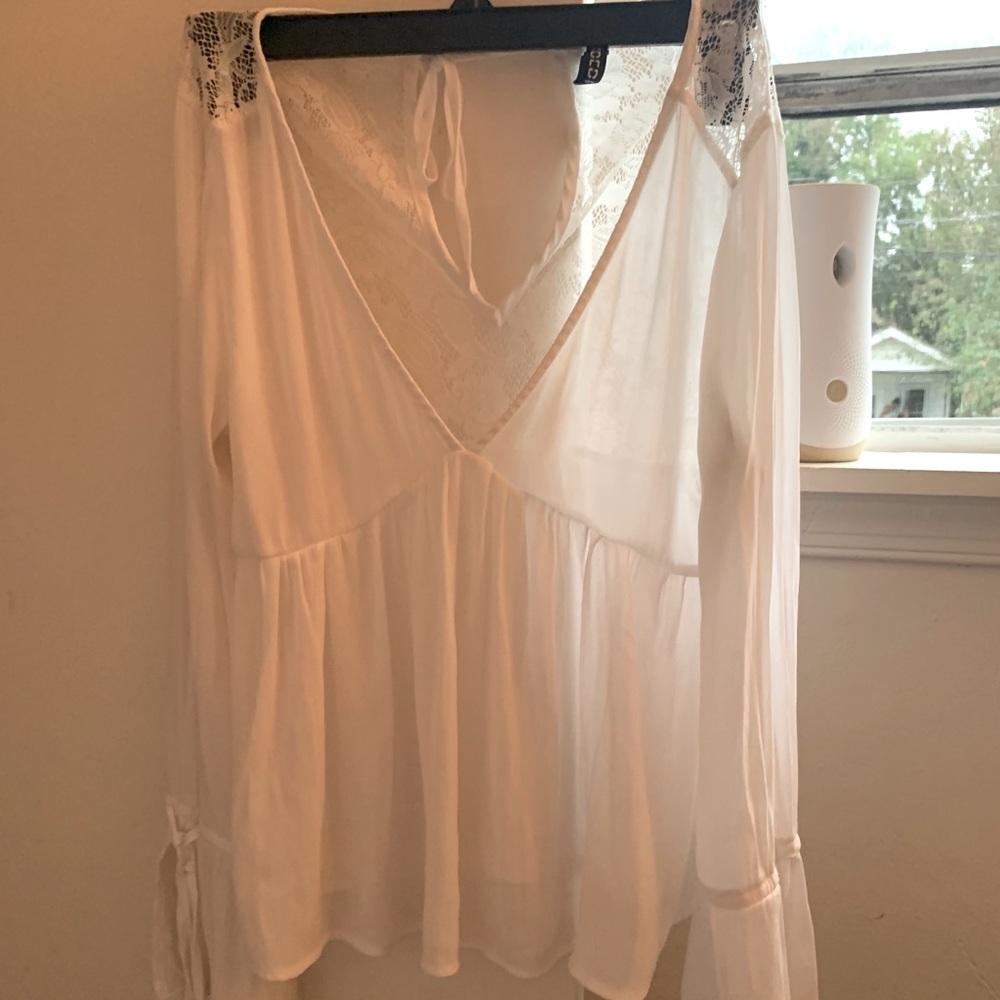Flowy Blouse With Lace Detail On Back